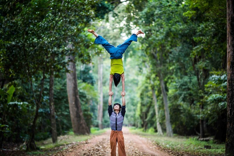 Two Phare Circus performers pose for a photograph in Siem Reap, Cambodia.